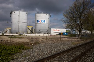 View of Exxon Mobil storage tanks of the petrochemical industry in the port of Rotterdam, Netherland