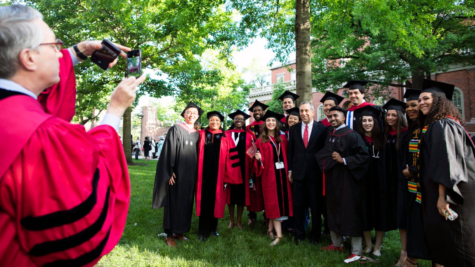 Dental School Dean William Giannobile photographed Bacow with students during Commencement for the Classes of 2020 and 2021.