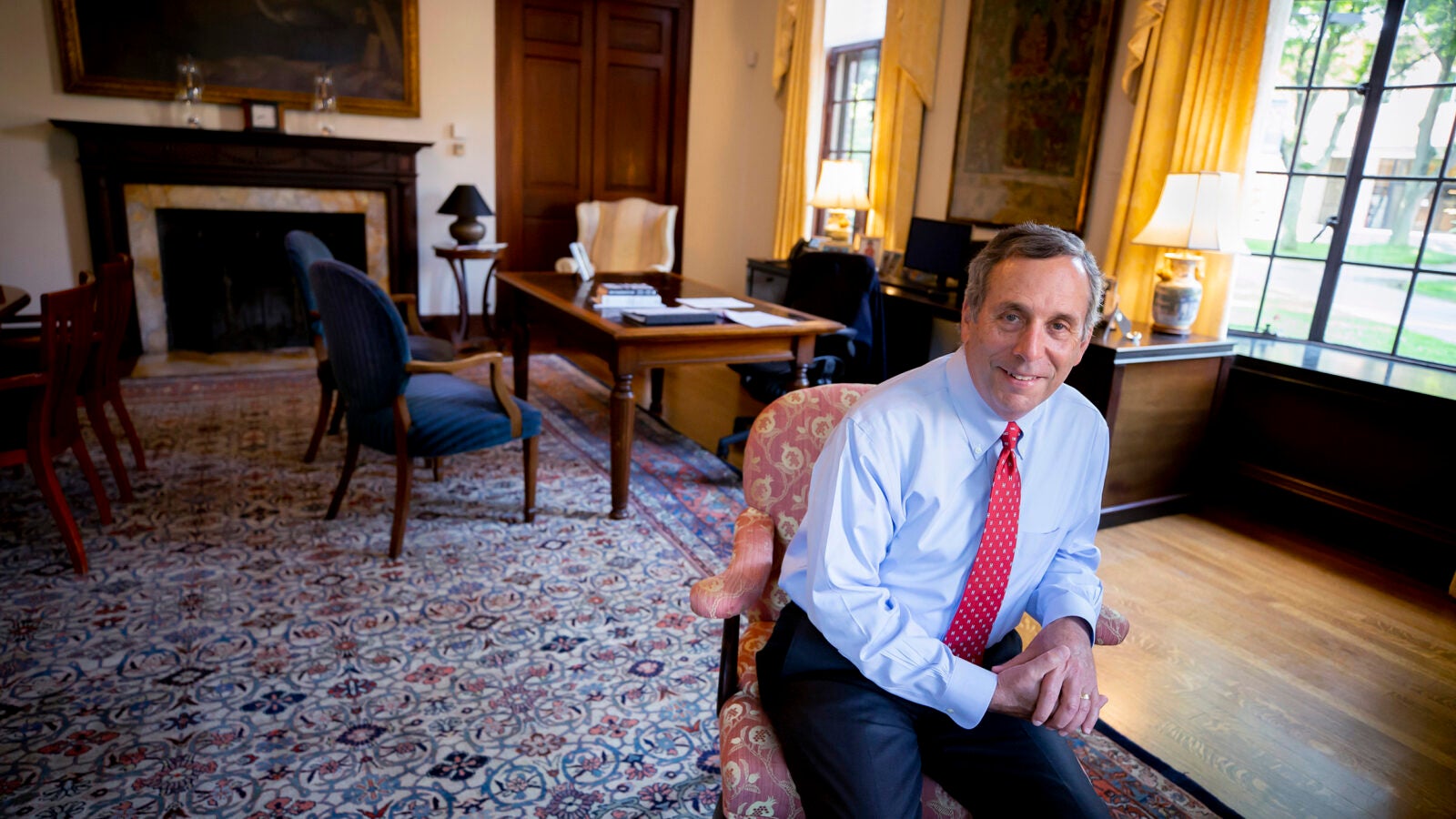 Larry Bacow in his Loeb House office on the first day of his presidency in July 2018.