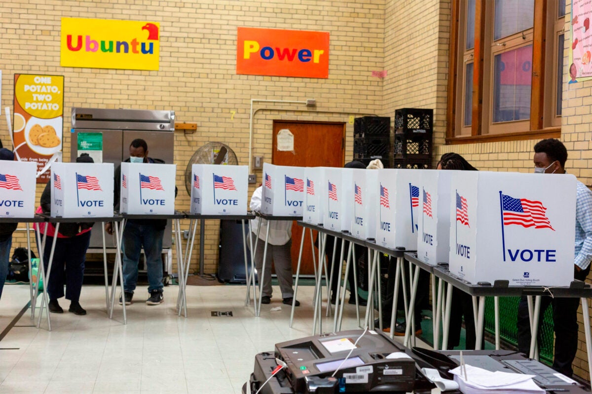 Voters in Detroit casting ballots in the 2022 midterm election. Danielle Allen points out that voting turnout rates in the U.S. are lower than other developed democracies.