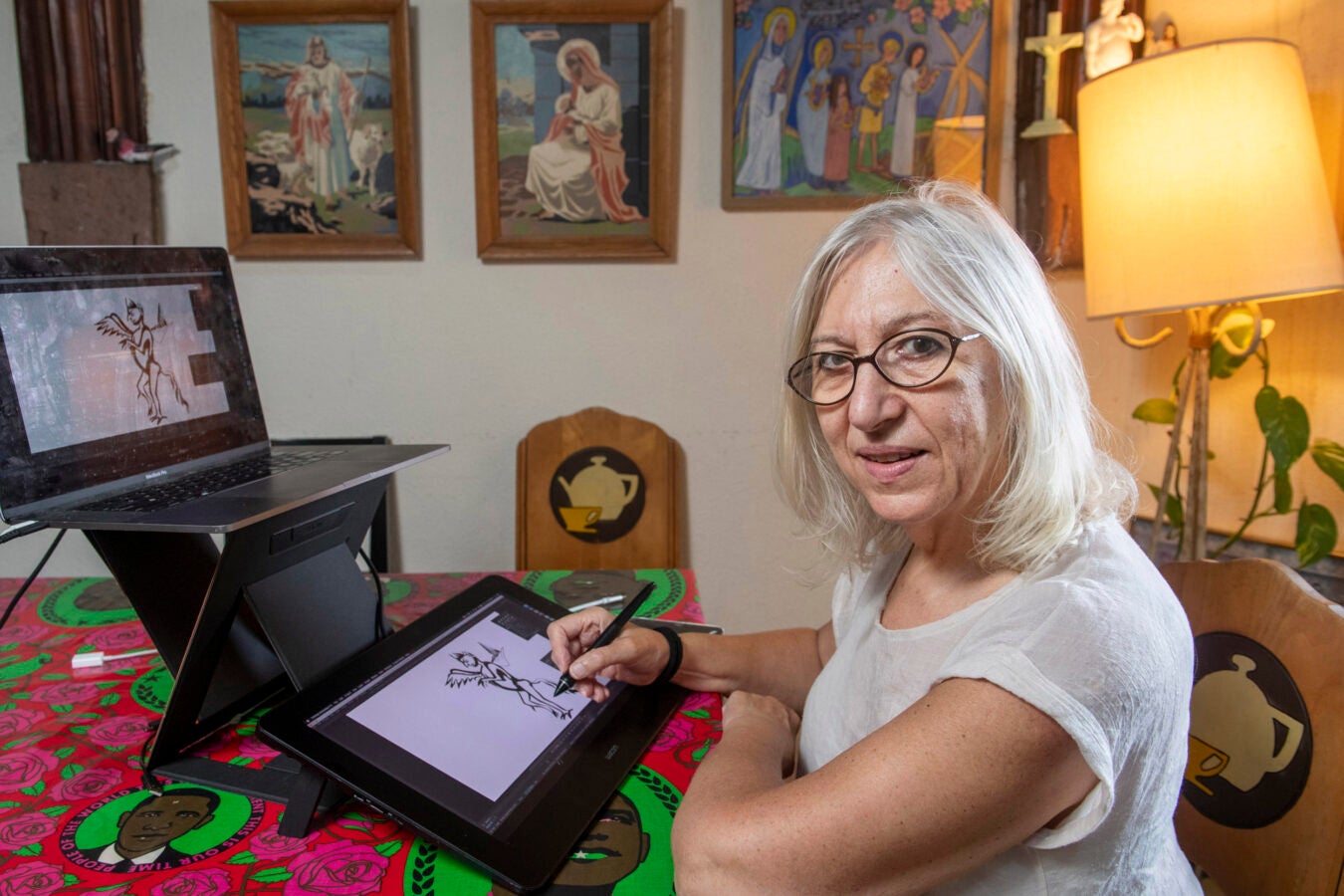 Ruth Lingford draws on a tablet in her studio.