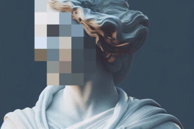 Pixelated face of human sculpture.