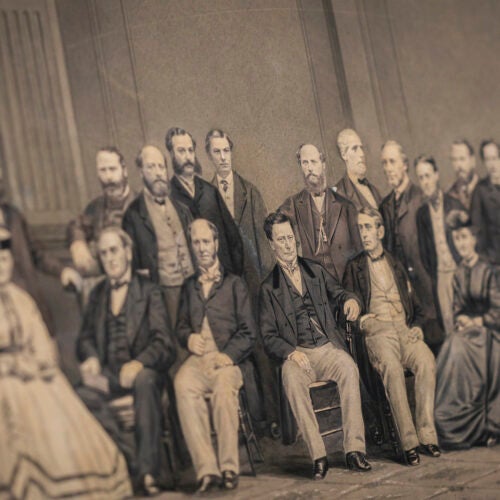 People in a group potrait in 1865 looking in different directions and not at the camera.
