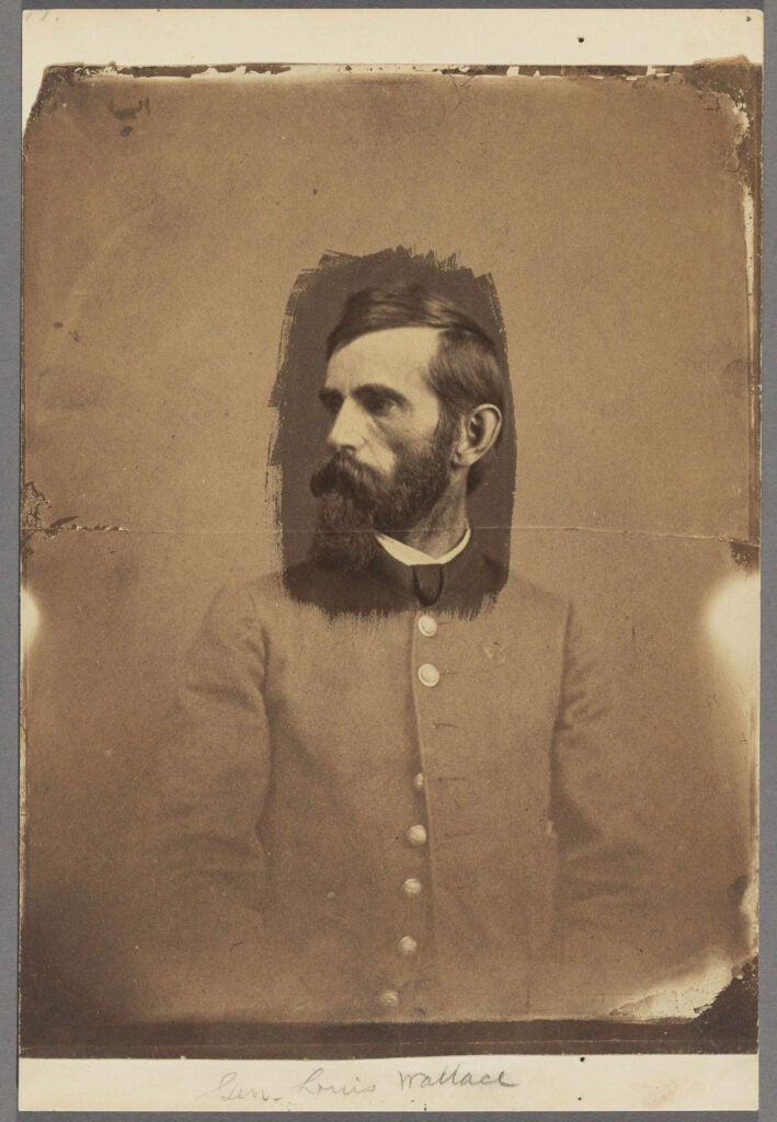 Salt print of Lew Wallce shows only the face coated and the rest of the image faded.