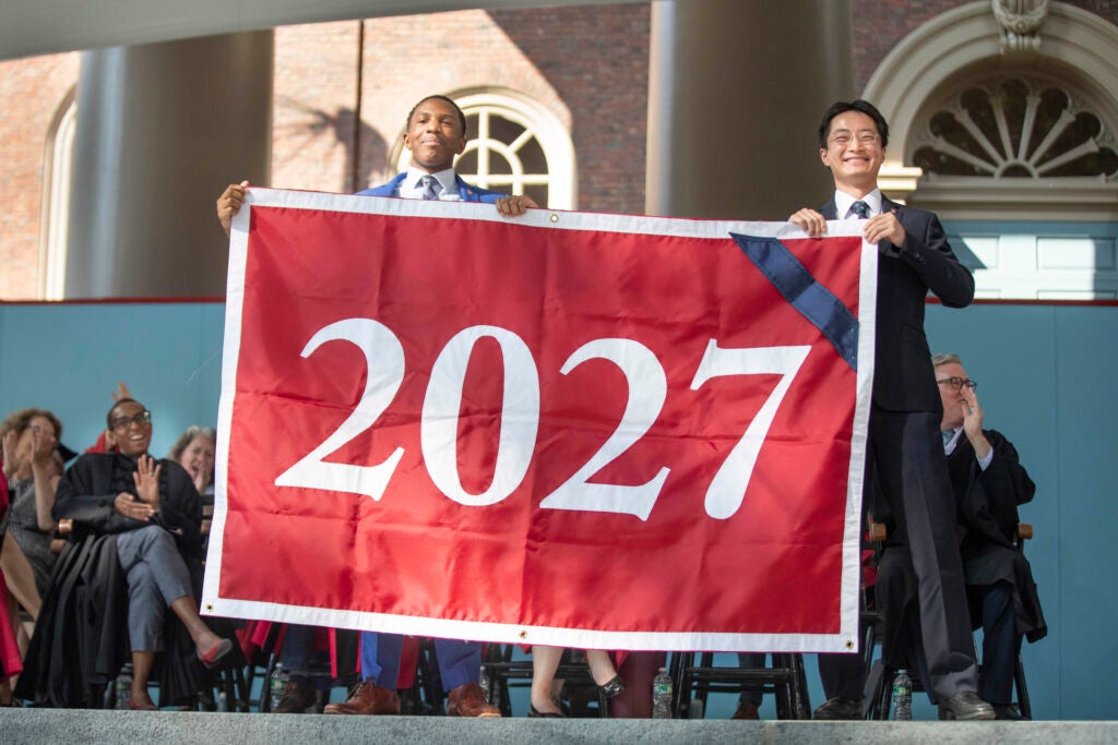 Two student holding a Class of 2027 banner.