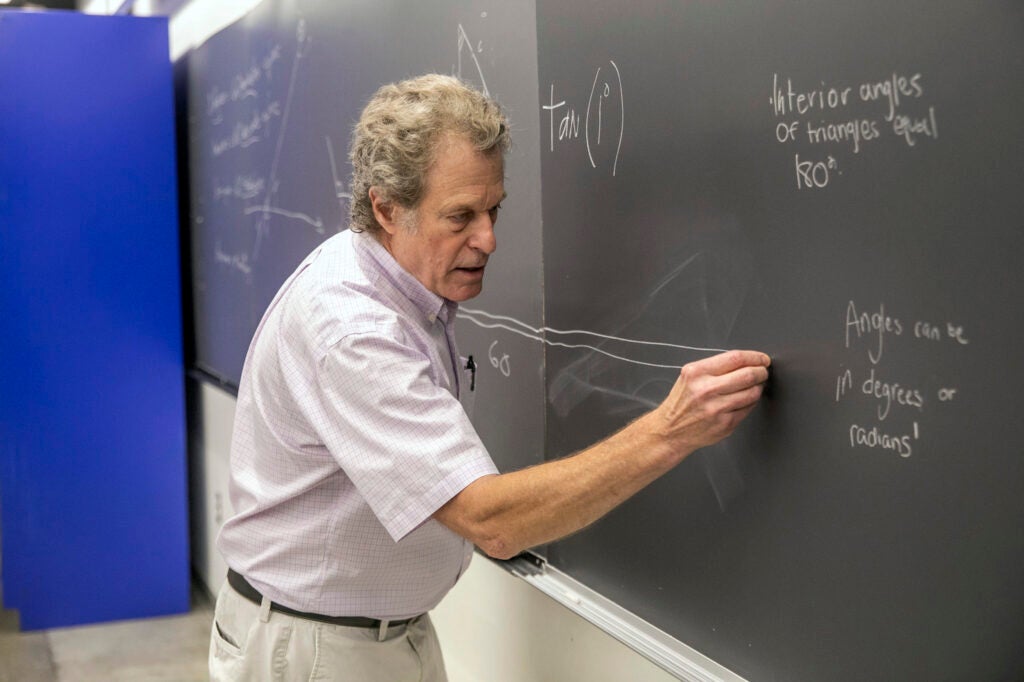 F.W. Wright Senior Lecturer in Astronomy Philip Sadler takes the helm at the chalkboard