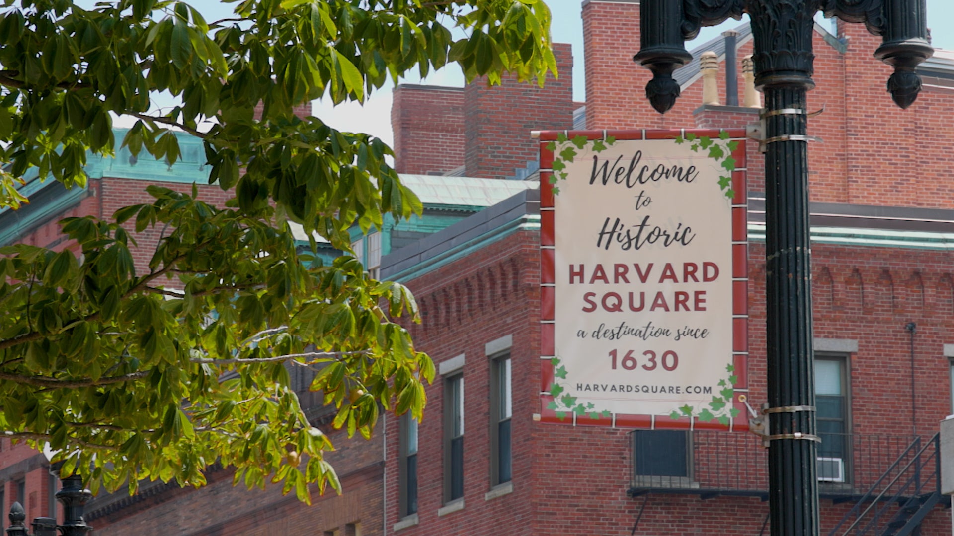 Sign welcomes visitors to Harvard Square.