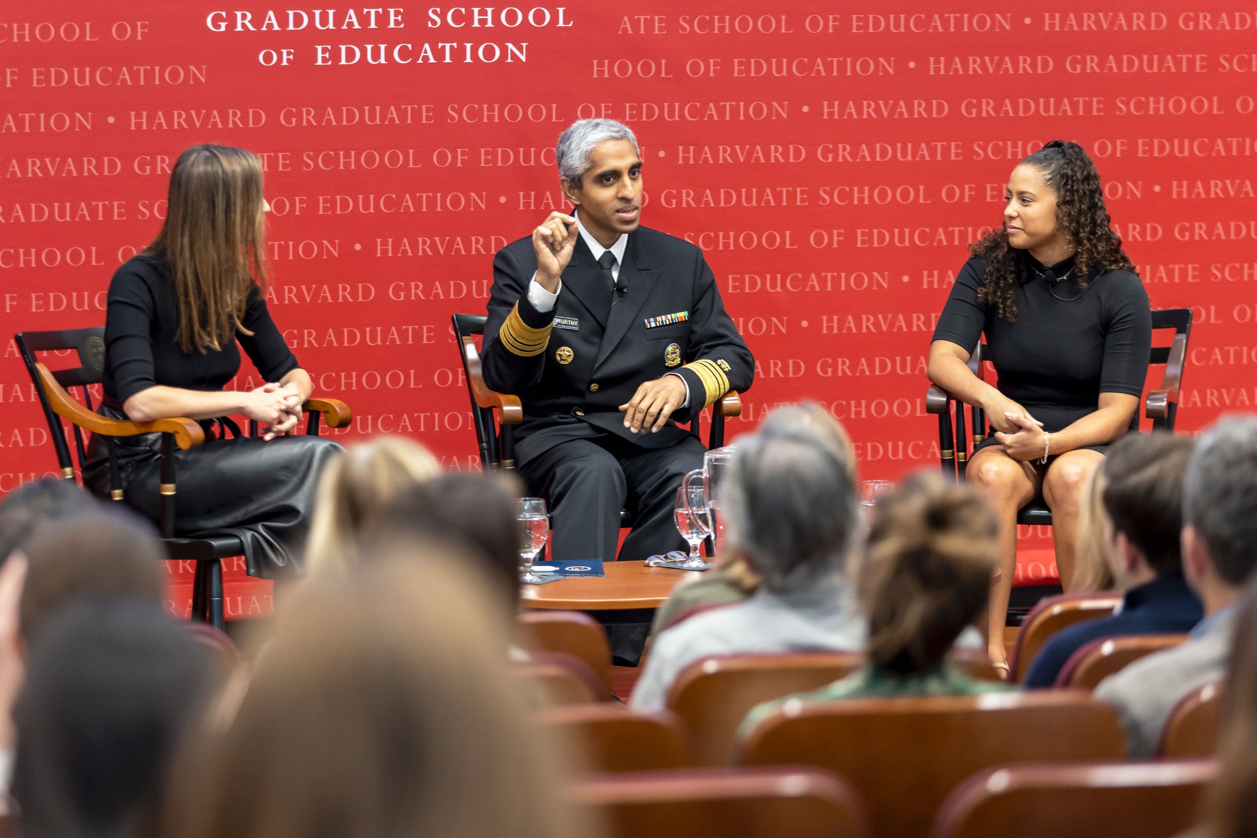 Emily Weinstein Vivek Murthy, U.S. Surgeon General and Destinee Ramos, Harvard College student Class of 2026 onstage at the Ed School.