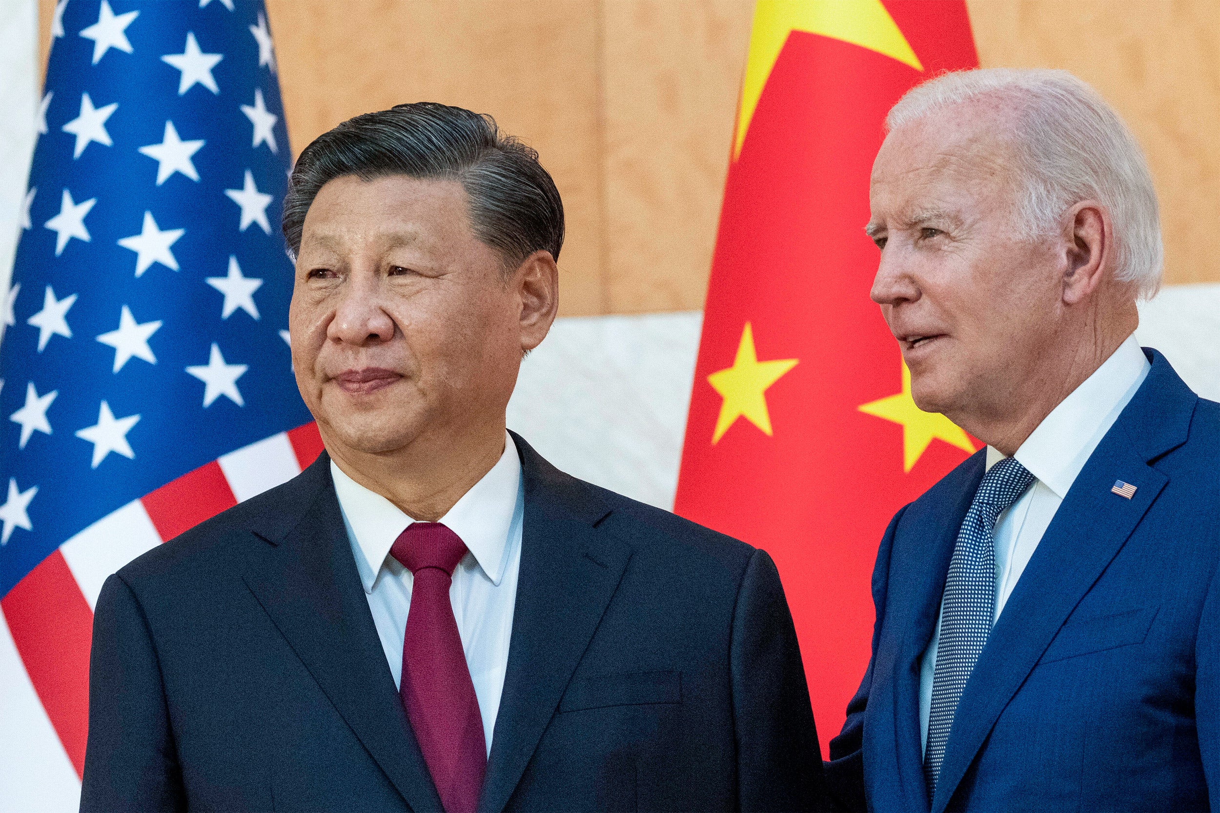 President Joe Biden, right, stands with Chinese President Xi Jinping.