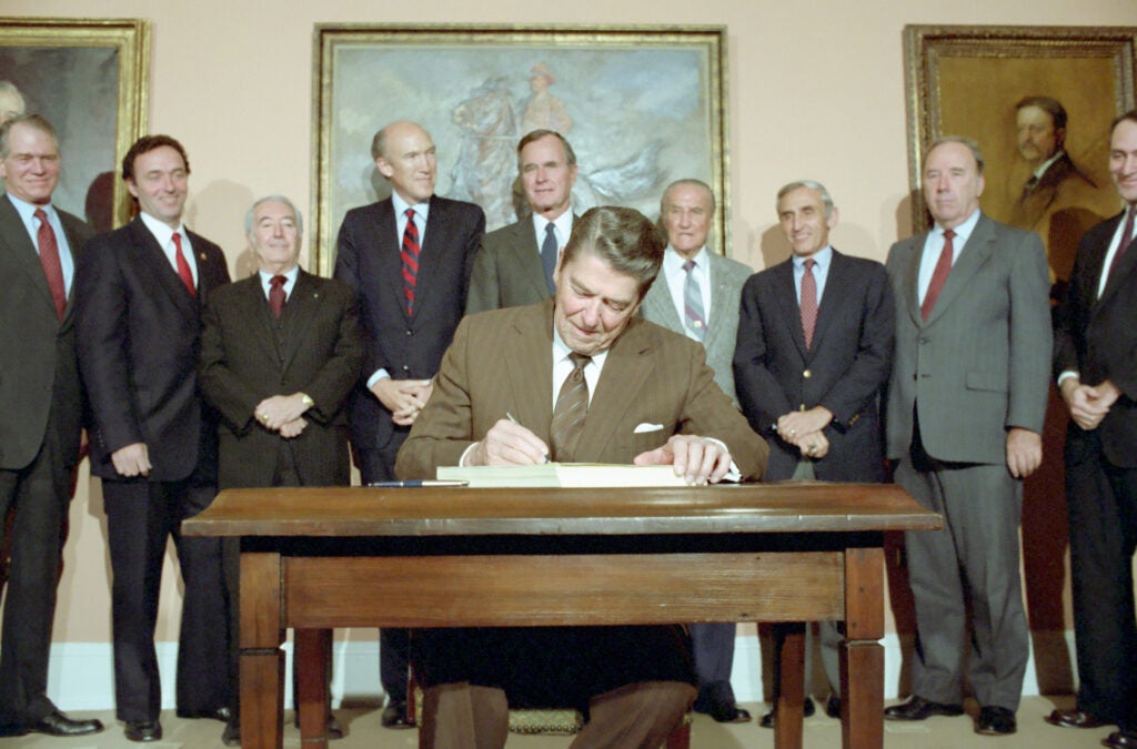President Ronald Reagan signing the Immigration Reform and Control Act of 1986 2500
