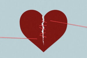Illustration of broken heart mended by forgiveness.