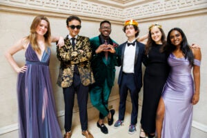 They include Madison Pankey (all ’24, from left), Fez S. Zafar, Chibuikem C. “Chuby” Uche, Jeremy Ornstein, Saylor Willauer, and Shruthi Kumar model their prom attire.