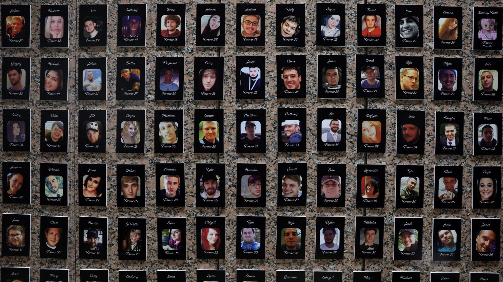 A displays of thousands of photos of people who died from the drug overdoses.
