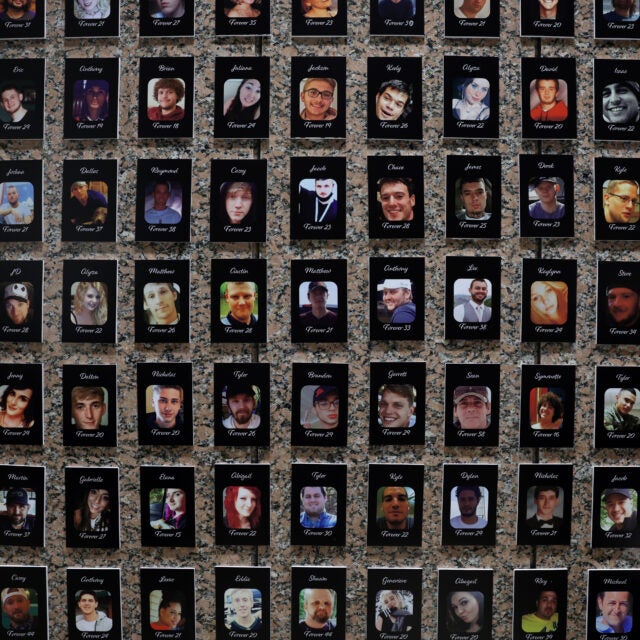 A displays of thousands of photos of people who died from the drug overdoses.