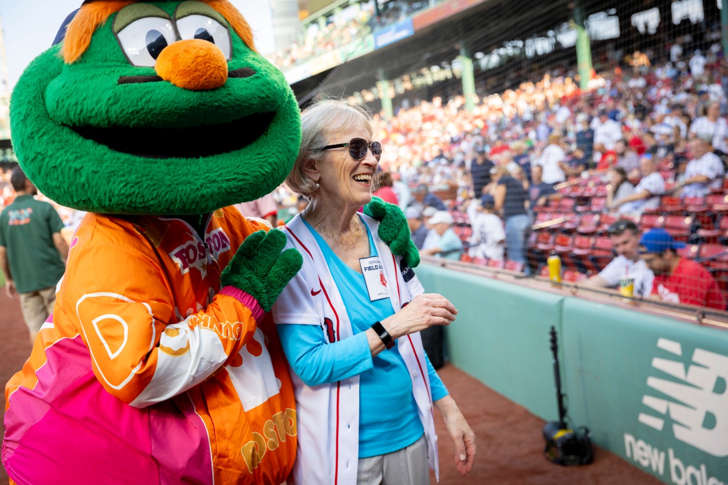 Wally the Green Monster (left) and Claudia Goldin. 