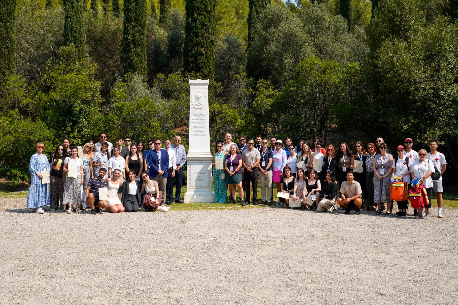 Participants at location where the first runner lit the torch to mark the beginning of the relay to Athens.
