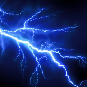 Blue lightning on dark background.