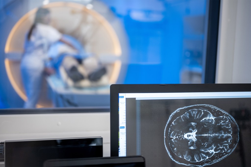 Patient being prepared for scans.