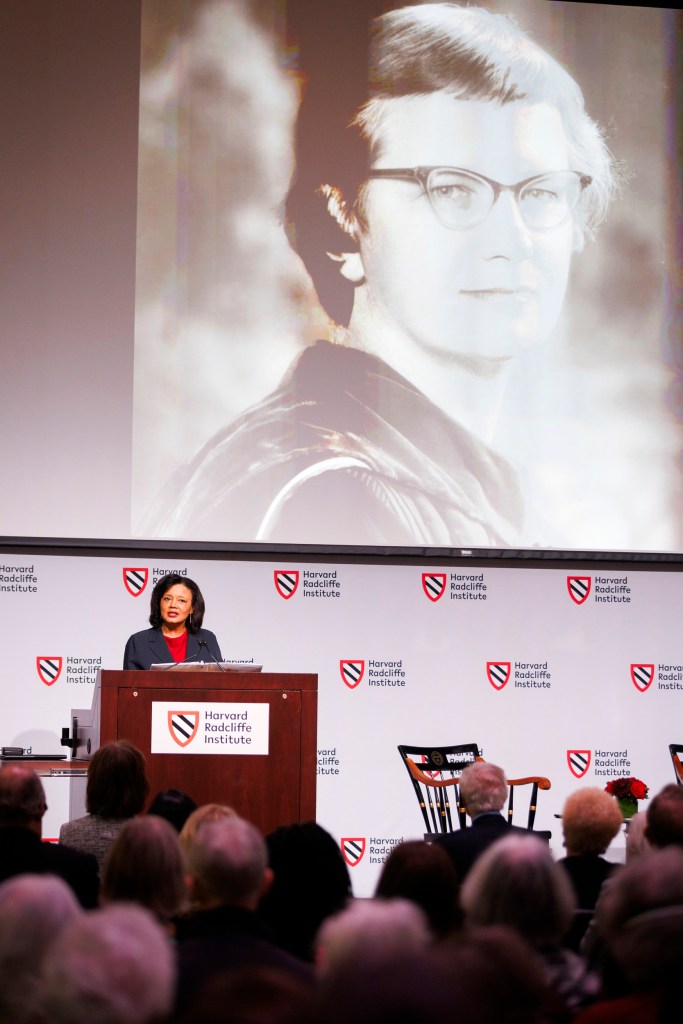 Radcliffe Institute Dean Tomiko Brown-Nagin with an image of In 1960, she was appointed the fifth president of Radcliffe College. 