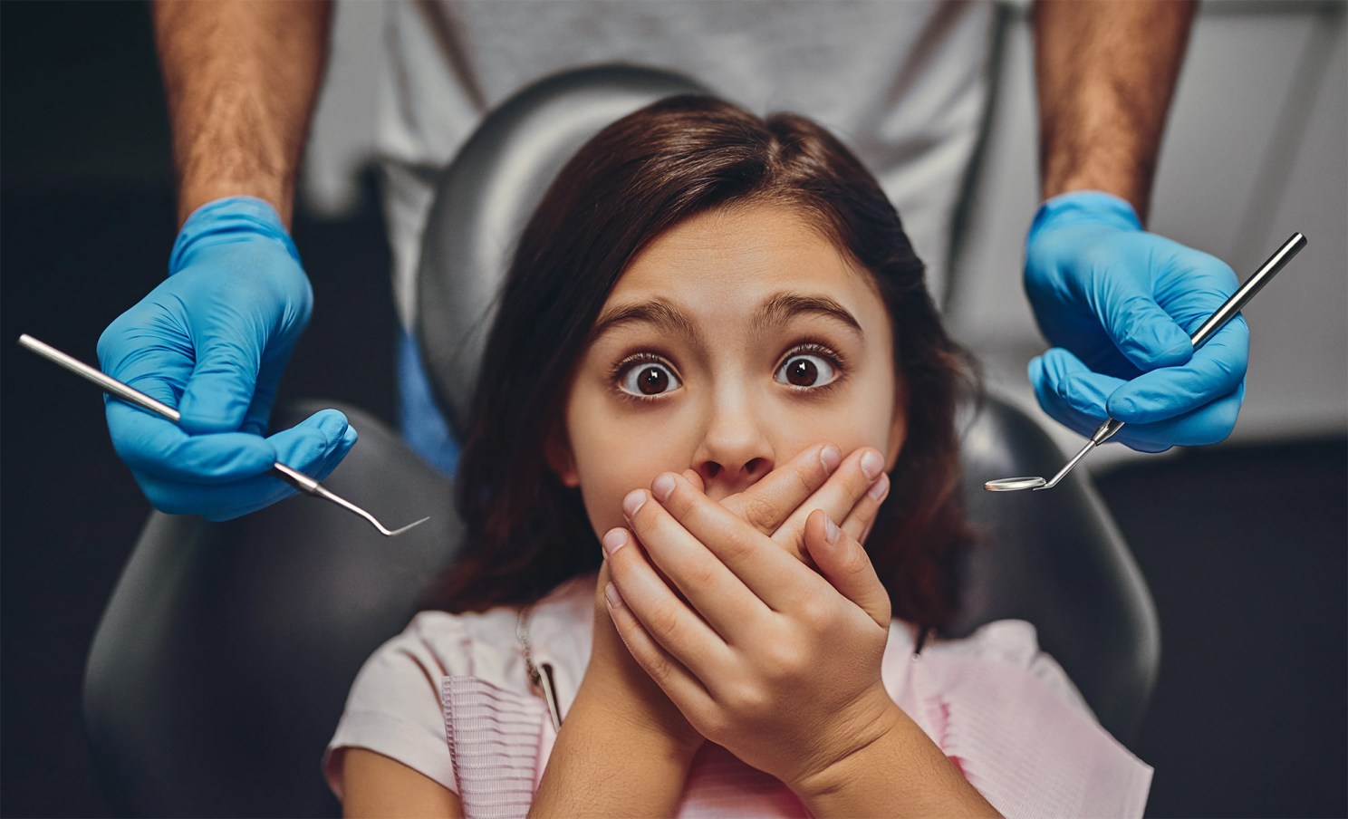 Child fearful at dentist office.