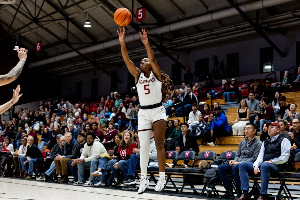 Gabby Anderson playing basketball. 