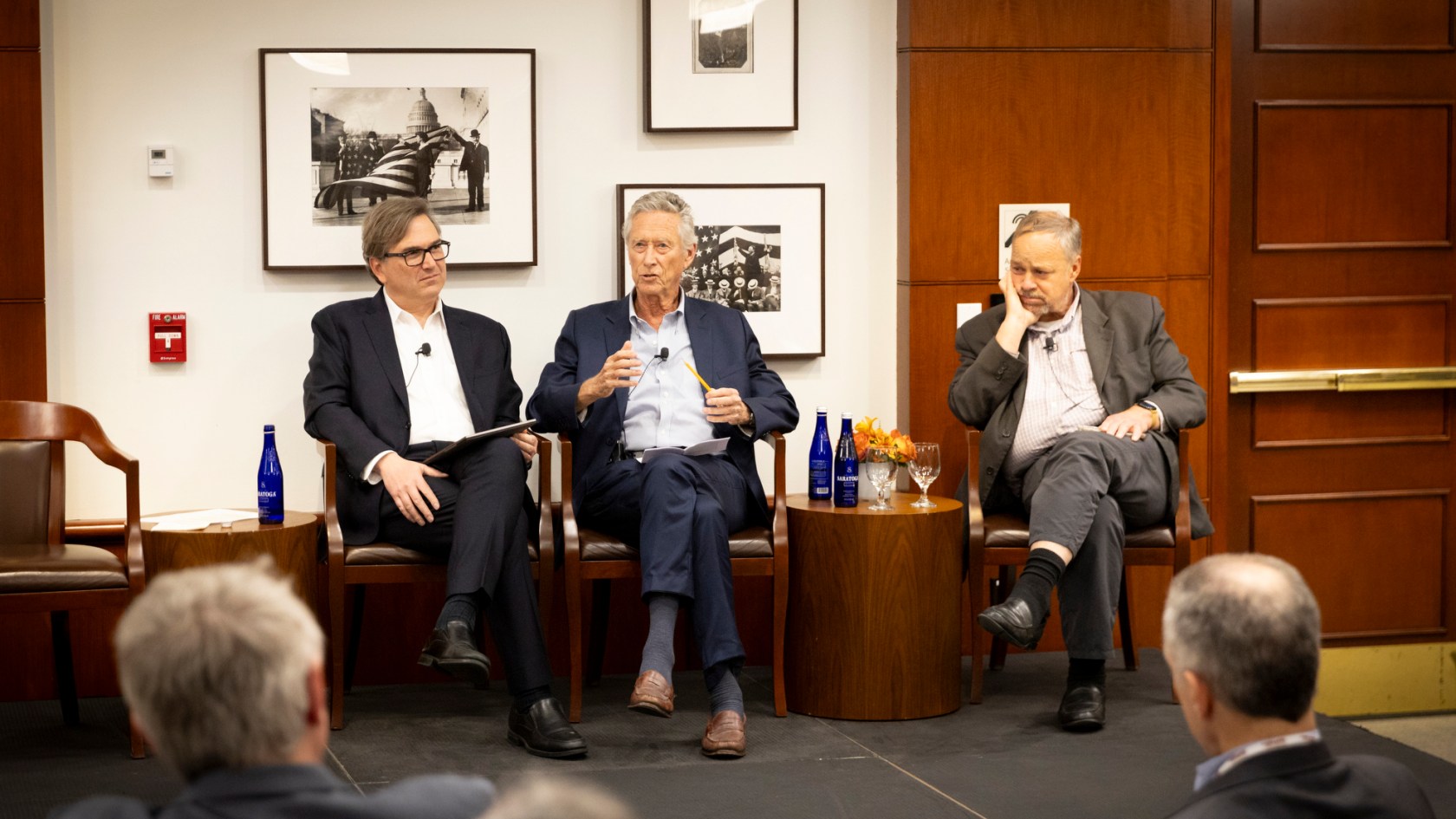 Jason Furman (from left), Olivier Blanchard, and Brad DeLong speaking during the event. 