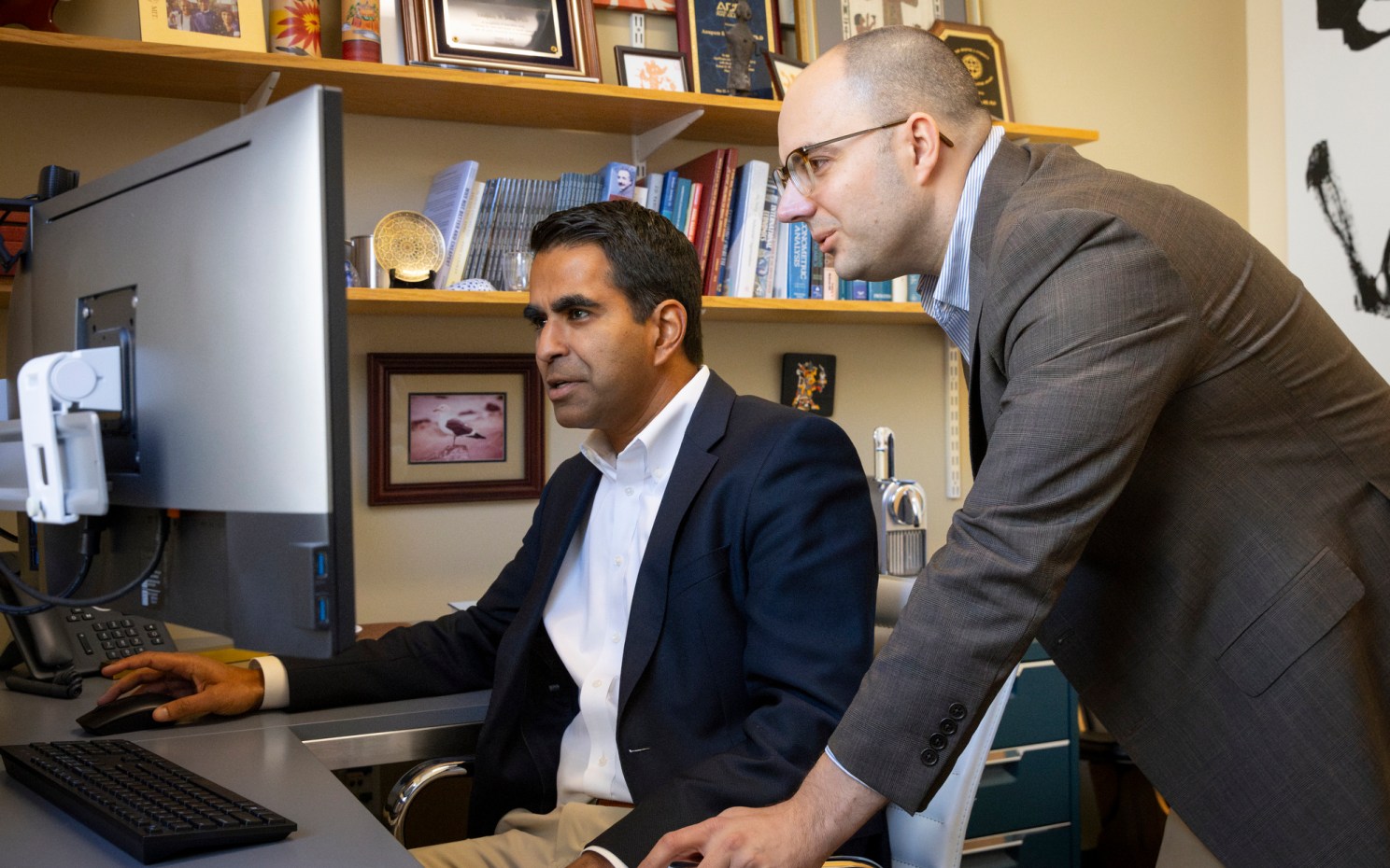 Anupam B. Jena (left) and Christopher Worsham.