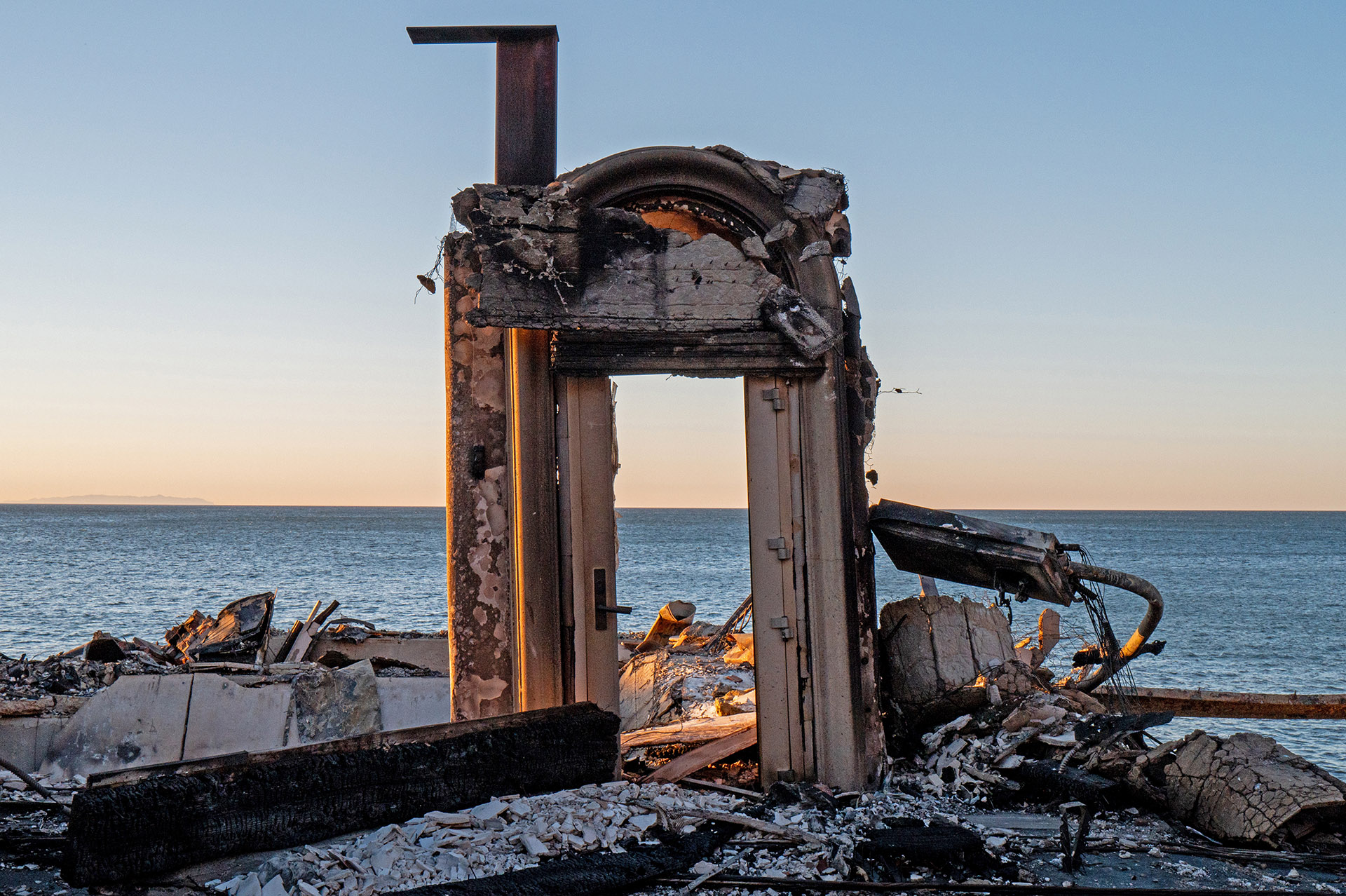 Entrance to a waterfront home burned in Los Angeles wildfire is all that is left standing. 