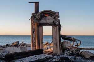 Entrance to a waterfront home burned in Los Angeles wildfire is all that is left standing.