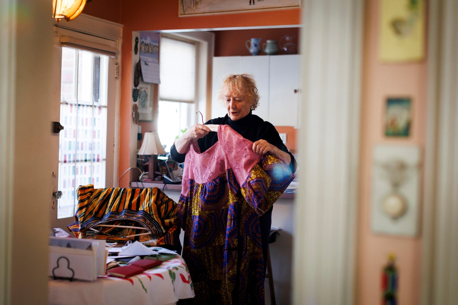 Diane speaks about her clothing from Ghana in her Brookline home.