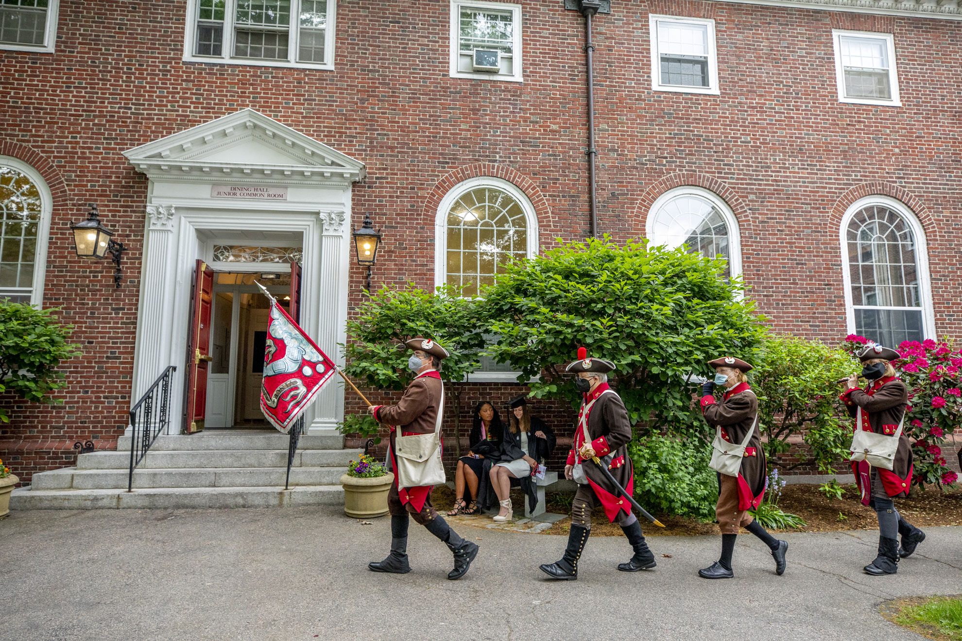 At 7AM the Fife and Drum Corp pass through Kirkland House Courtyard.