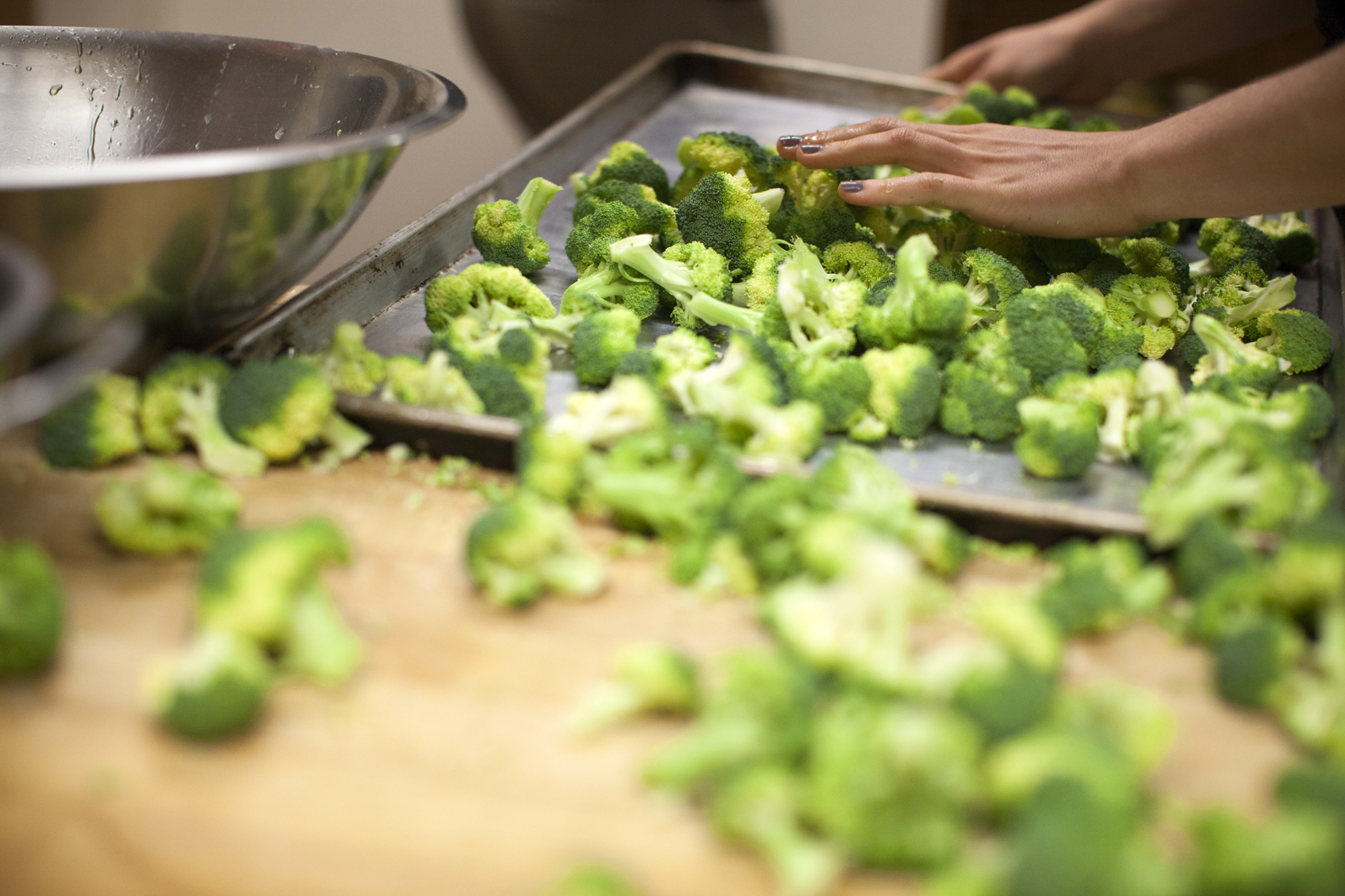 Dudley Co-op students prepare broccoli for the meal.