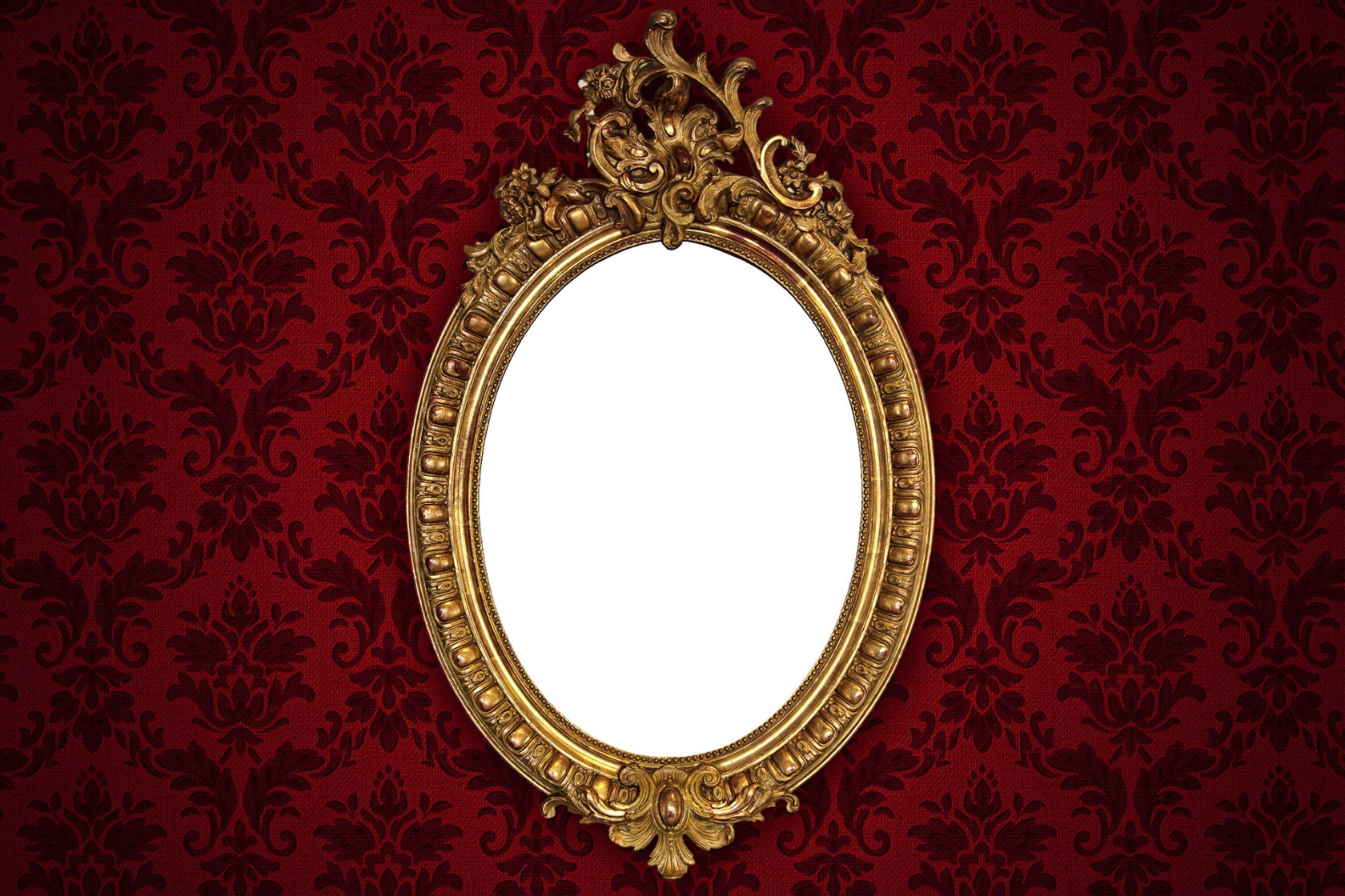 Mirror set in ornate gold frame.