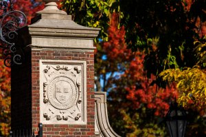 Harvard gate with Veritas shield.