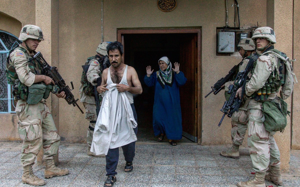 American soldiers at a raid of a residence in Baghdad, Iraq in 2003.
