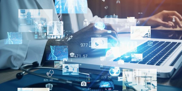 Illustration of doctor looking at medical icons.