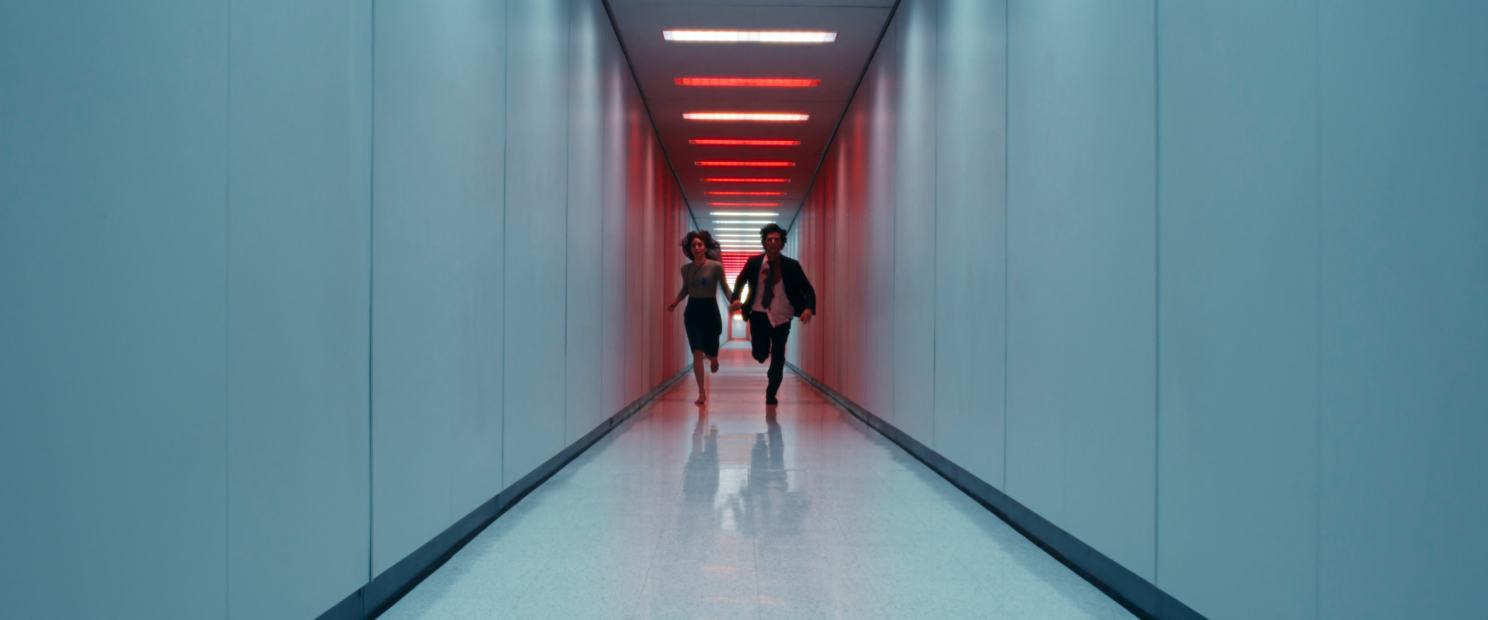 two character running down a hallway
