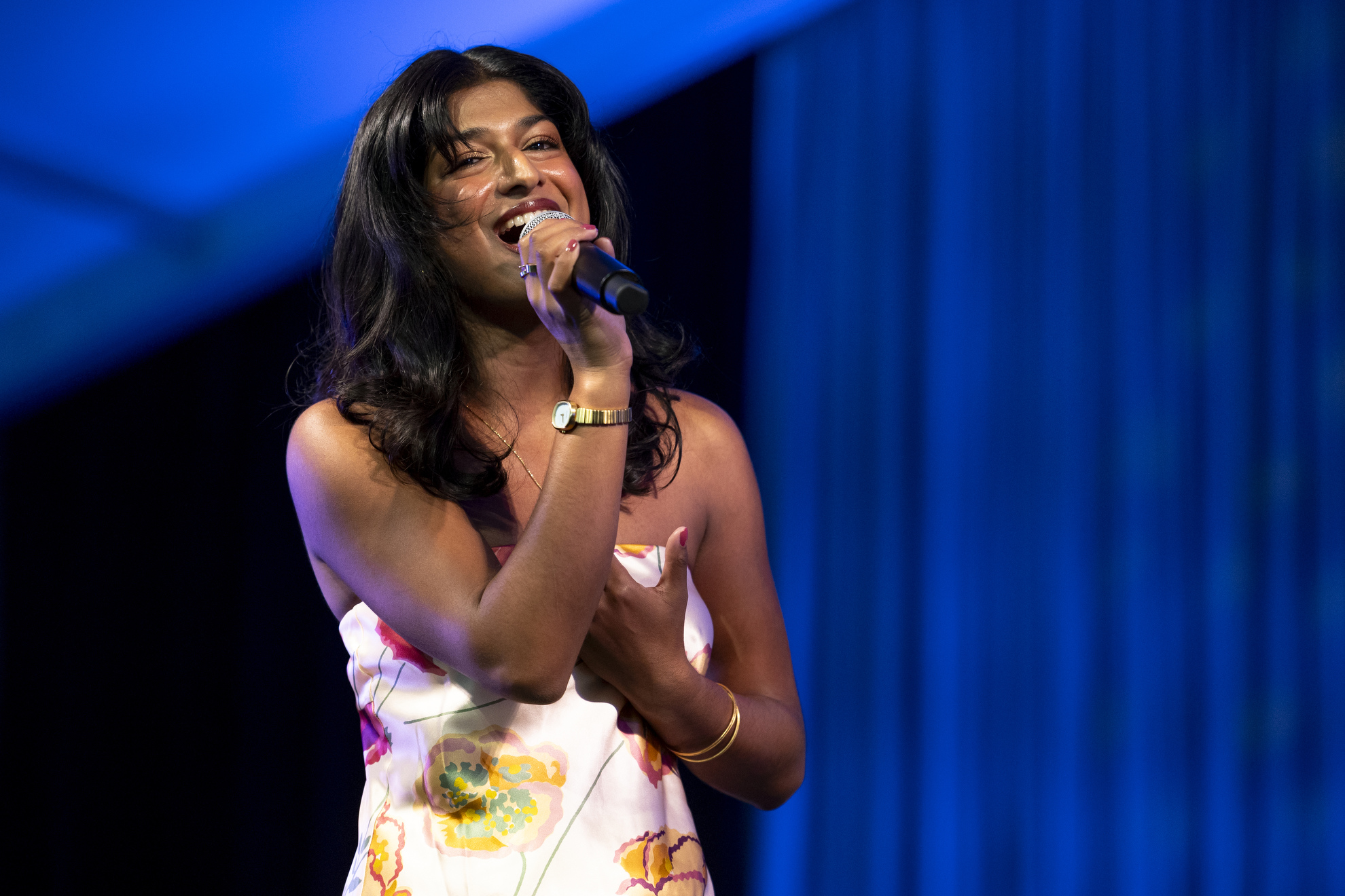 Anoushka Chander '25 sings during the Charles Revival and Friends performance at the Science Center Plaza tent.
