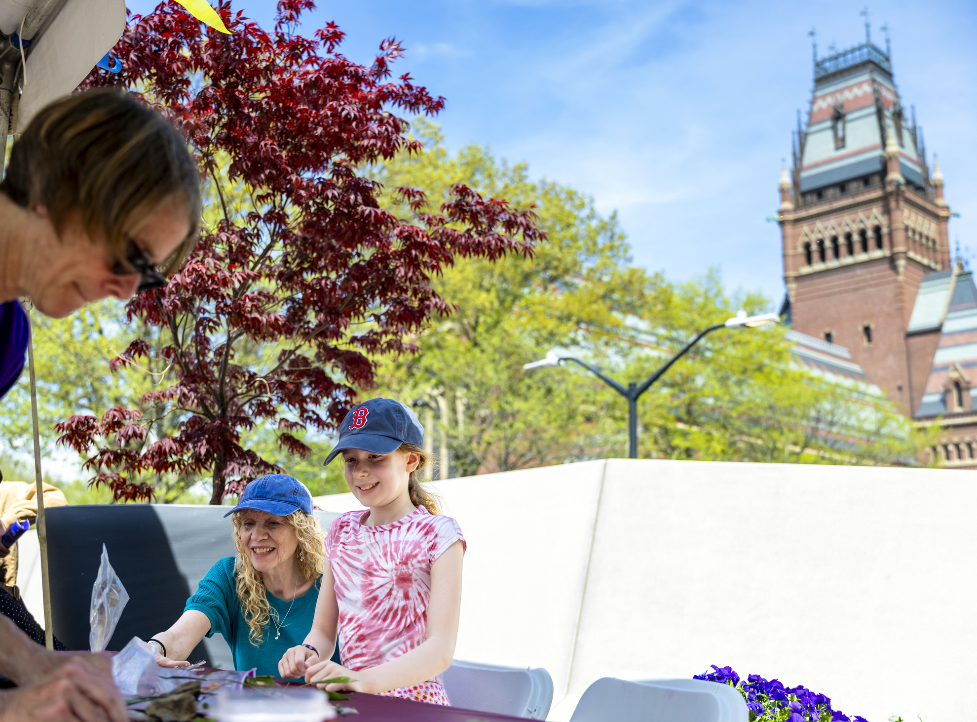 Emily Huttin (right) makes a Cyanotype in the Science Center Plaza.