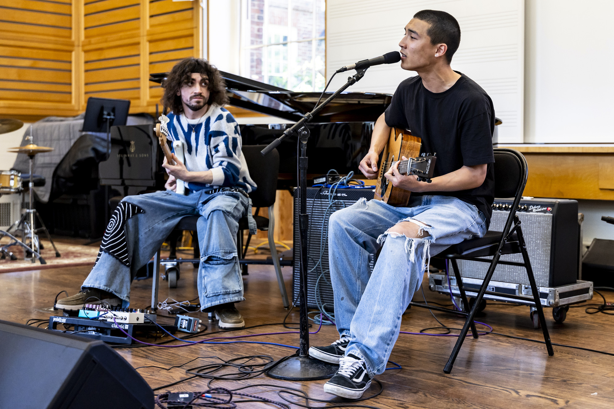 Dexter Suhn ’27 (right) performs with Rocco Rizzi in Holden Chapel.