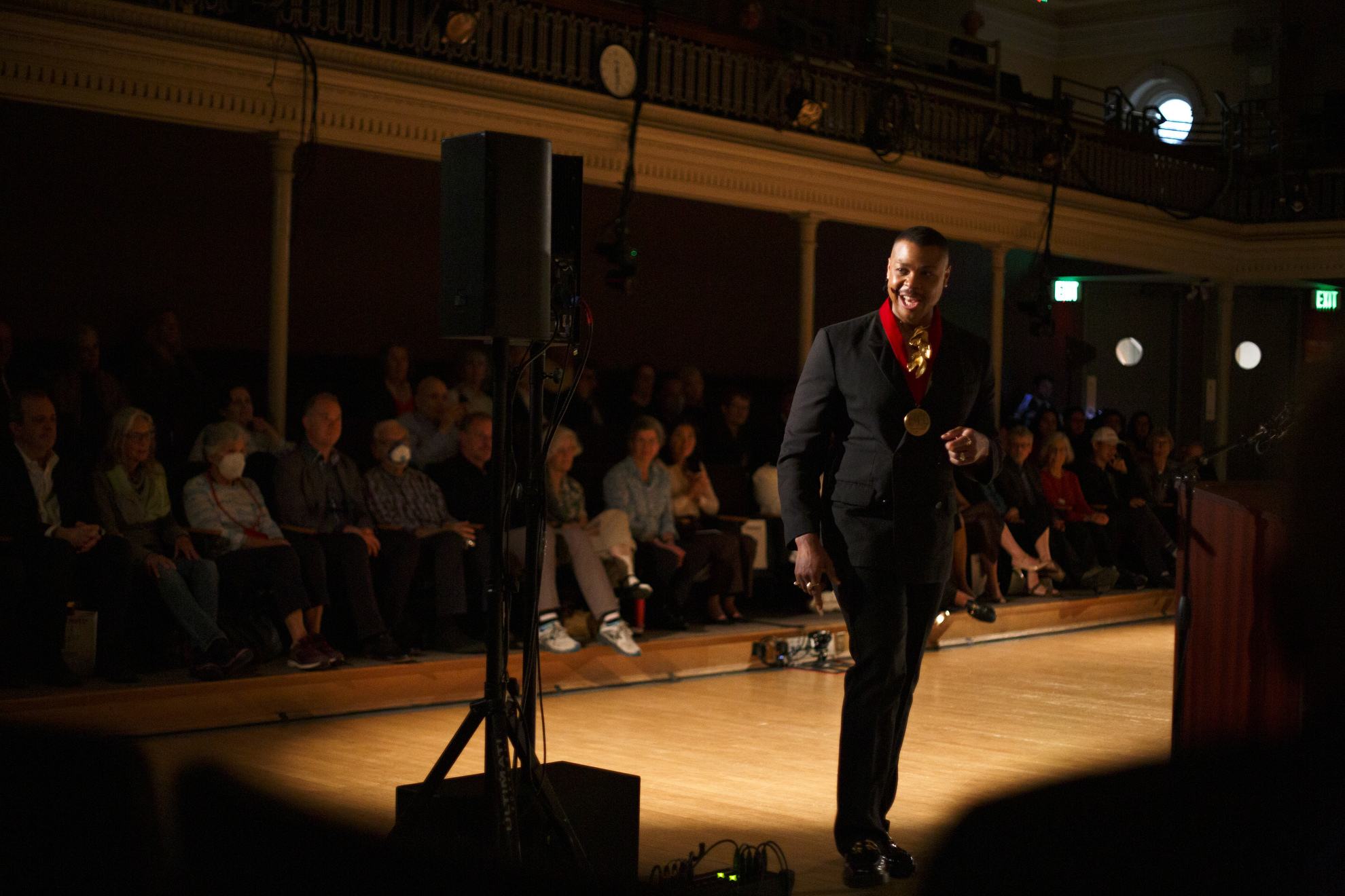 Operatic bass-baritone Davóne Tines ’09 performs in Lowell Lecture Hall after receiving the 2025 Harvard Arts Medal.