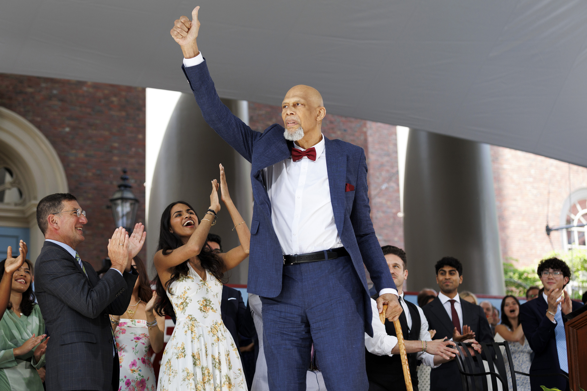 Guest Speaker Kareem Abdul-Jabbar (center) arrives on stage.