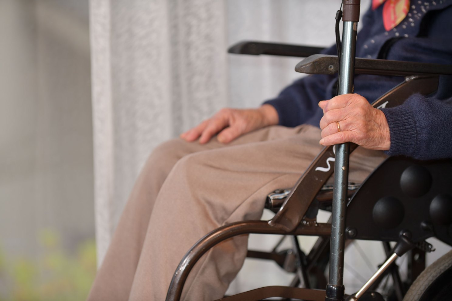 Senior woman sitting in a wheelchair.