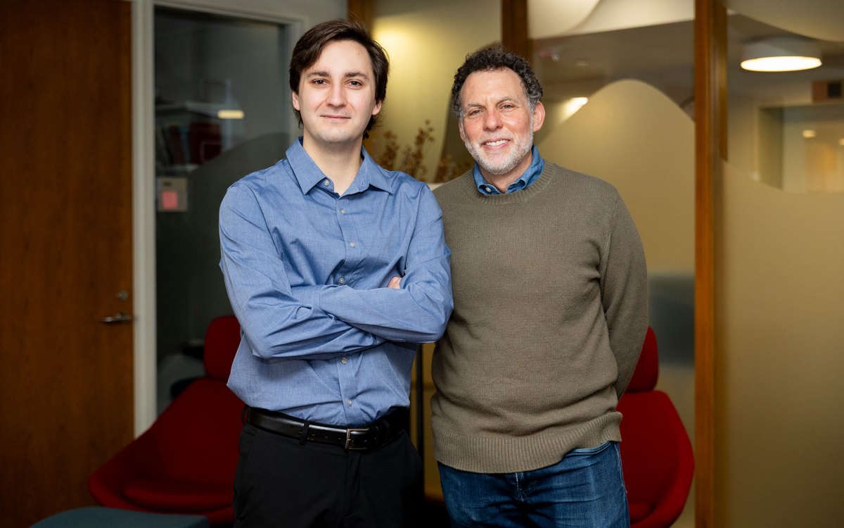 Lucas Woodley ’23, Ph.D. student, (left) and Professor of Psychology Joshua D. Greene.