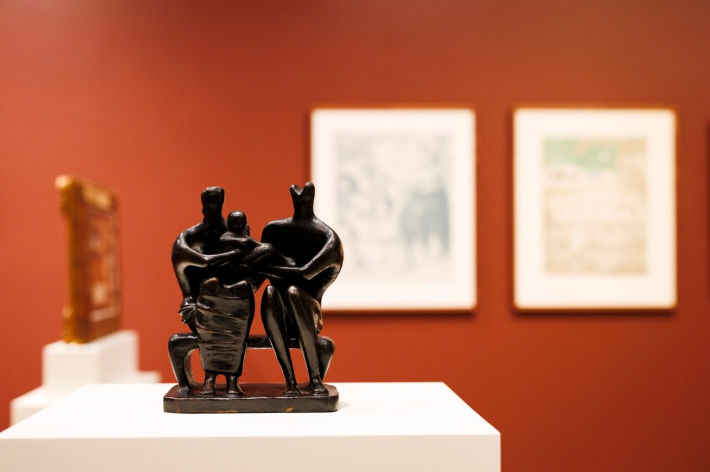 Sculpture in bronze titled Family Group, 1945, Bronze. Henry Moore, British