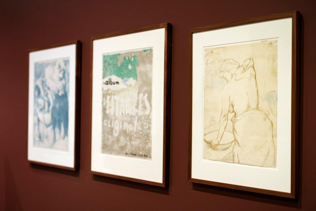 Featured in a series of hung pieces, “Woman Washing Herself,” lithograph on cream wove papwork by Henri de Toulouse-Lautrec.
