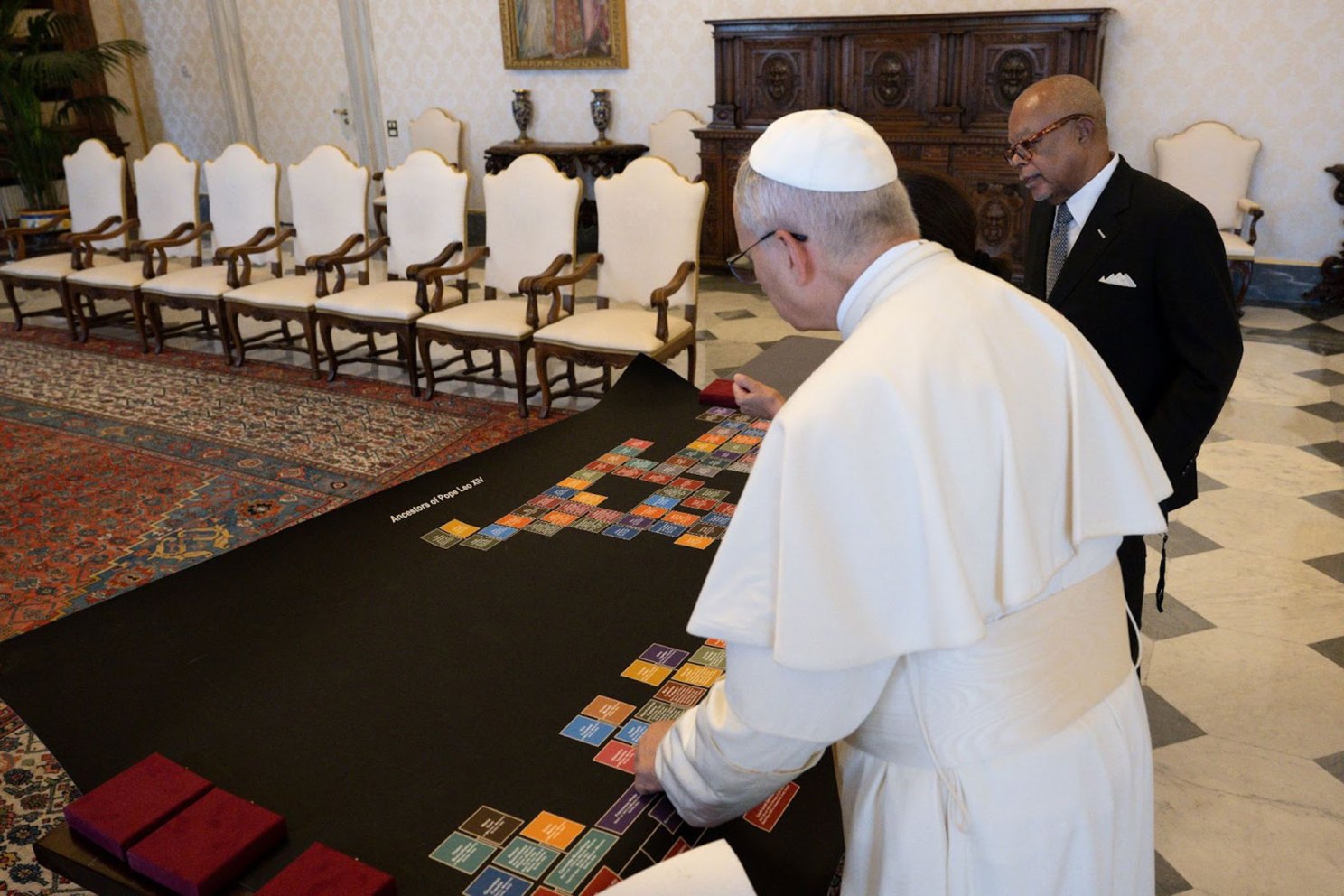 Henry Louis Gates Jr. showing Pope Leo XIV his family tree.
