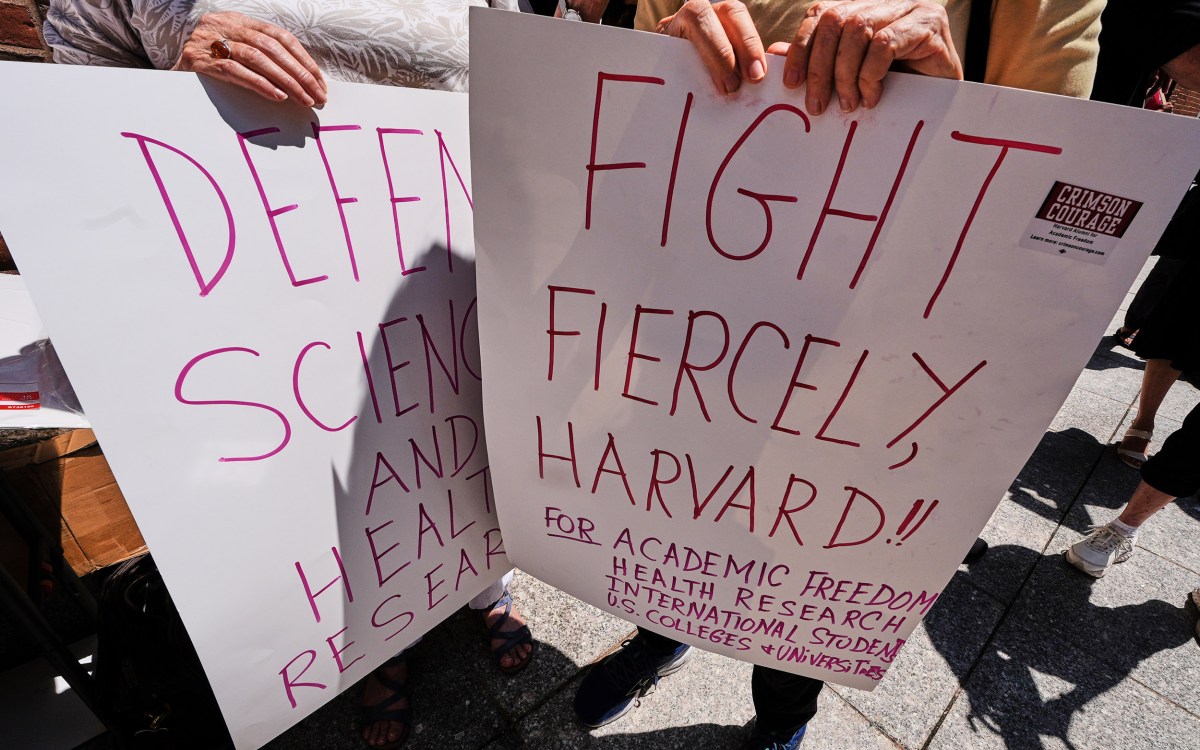 Protesters gather outside the Moakley Federal Courthouse.