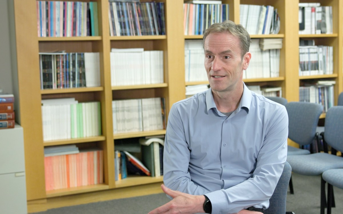 Professor Duane Wesemann being interviewed by the Gazette