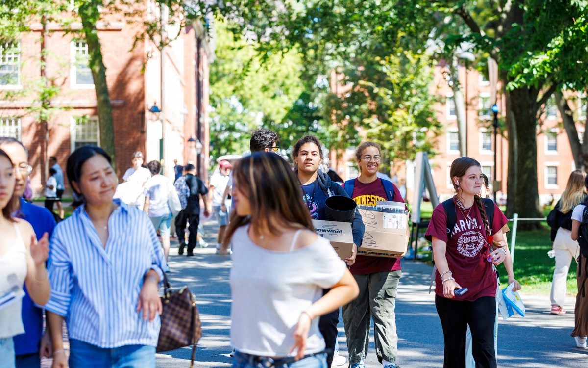First-year students and their families in Harvard Yard during move-in day.